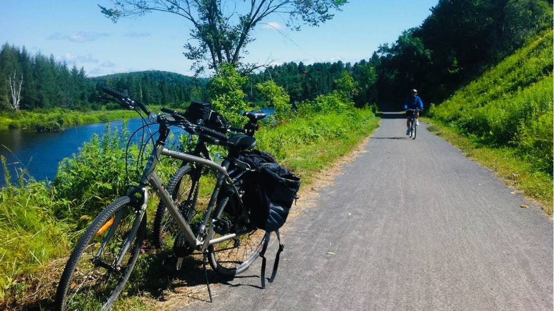 Flat and car-free, the converted railway trail offers a worry-free biking experience | <i>Robin Esrock</i>